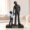 Flowman Man met kind – beeldje met persoonlijke tekst – Galaxy Black met lichtblauw kindershirt – conceptafbeelding