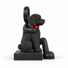 Zijaanzicht vanaf de kant van de hond van de zittende Stickyman-decoratie.
